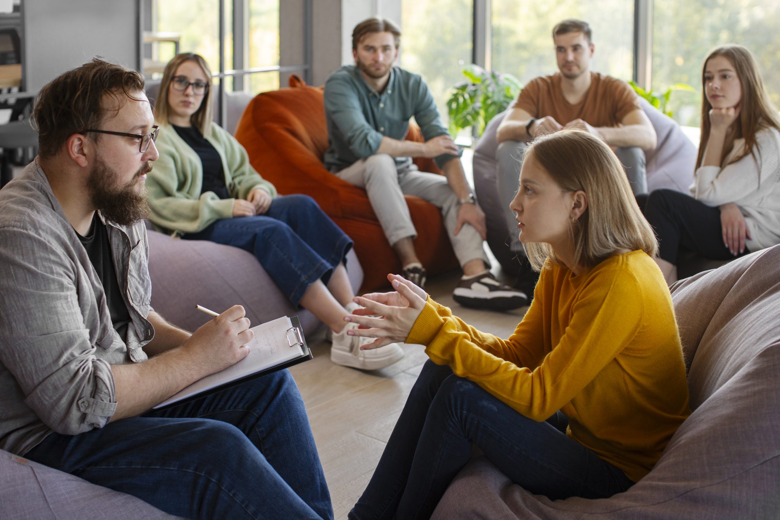 https://thedrpsycho.com/wp-content/uploads/2025/09/authentic-group-therapy-meeting-scaled.jpg